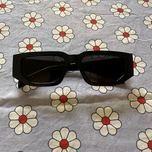 “prada” sunglasses